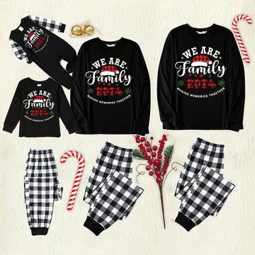 "We are Family" Santa Hat Monogram Print Black Long Sleeve Top with Black And White Plaid Pants Family Matching Pajamas