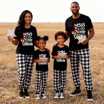 Jesus Is The Reason For The Season Family Christmas Pajamas Set - Black Top Black and White Plaid Pants White Graphic Text
